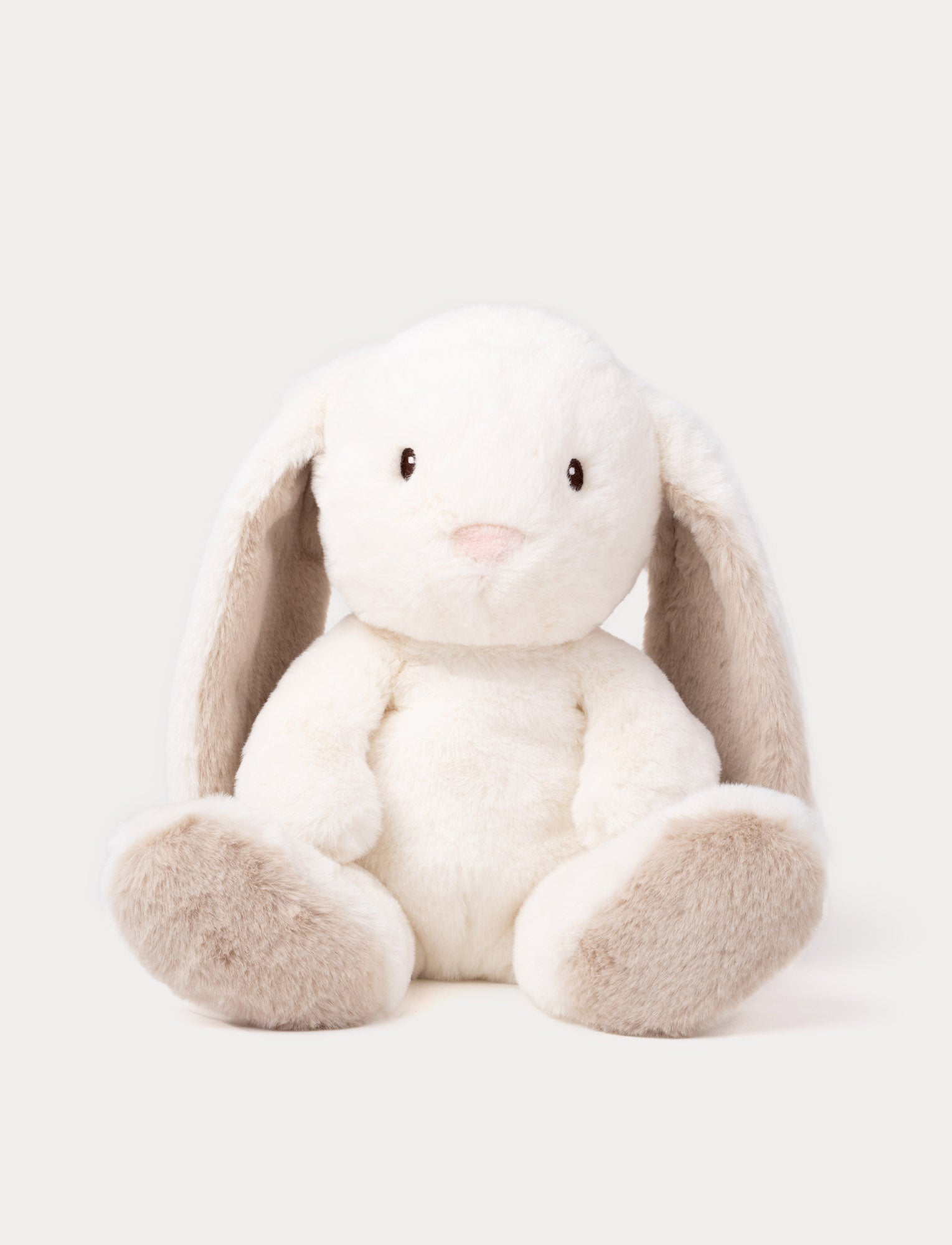  Image of A cream plush bunny with silky-soft fur, faux suede detail on its back, and embroidered eyes.