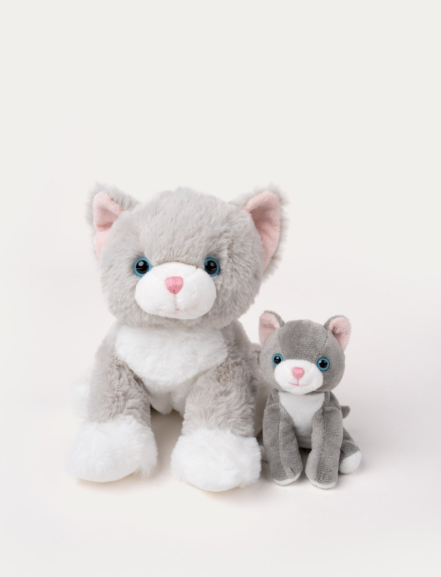 Soft grey and white cat plush with a smaller kitten plush that can be stored inside a zippered pouch.
