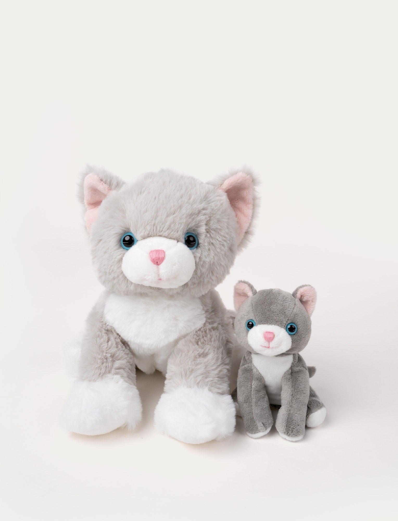 Image of Soft grey and white cat plush with a smaller kitten plush that can be stored inside a zippered pouch.