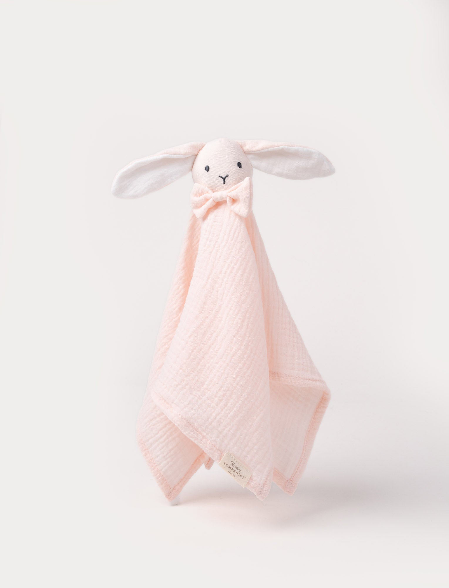  Image of Soft baby blanket with a plush pink bunny head, long floppy ears, and a small bow.