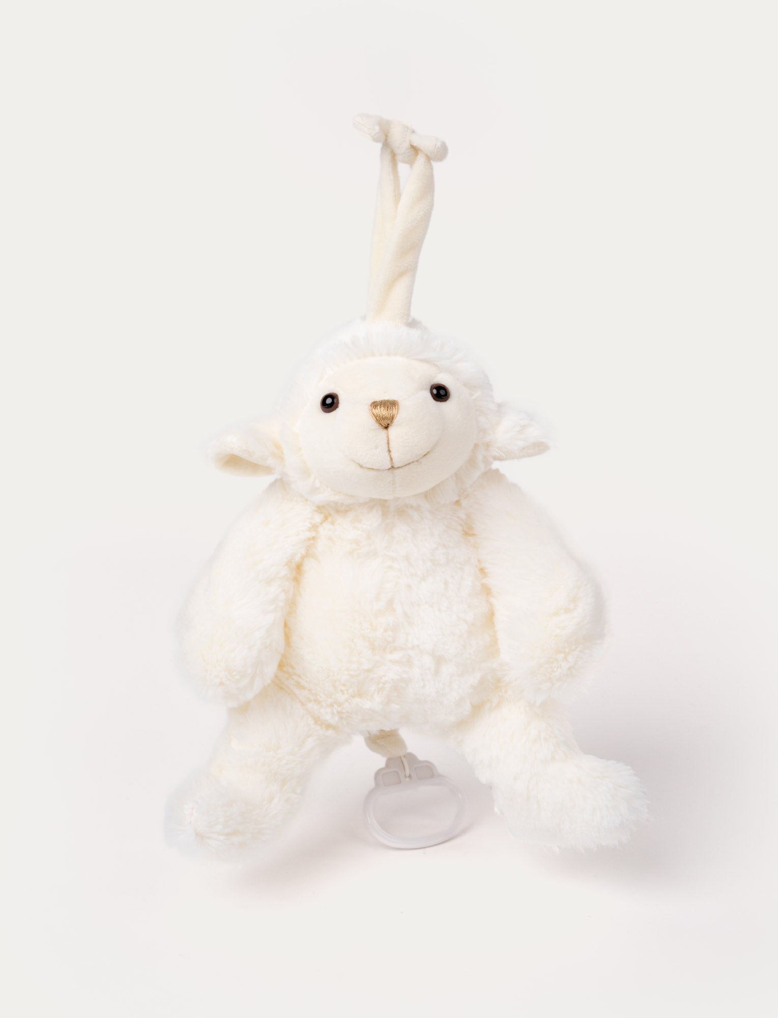  Image of Soft white lamb musical plush with a gold nose, a pull-string, and a loop for hanging.