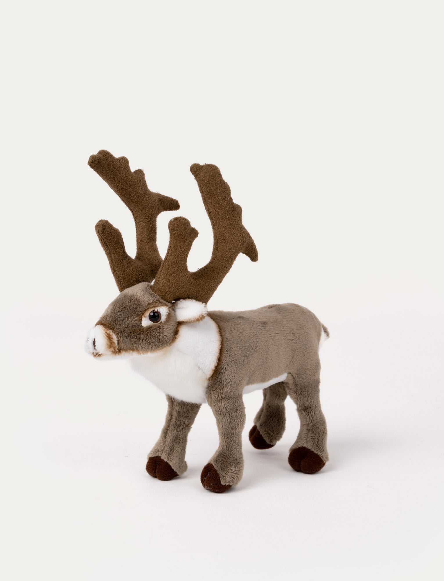 Image of Soft reindeer plush with brown fur, white accents, large antlers, and shiny black eyes.