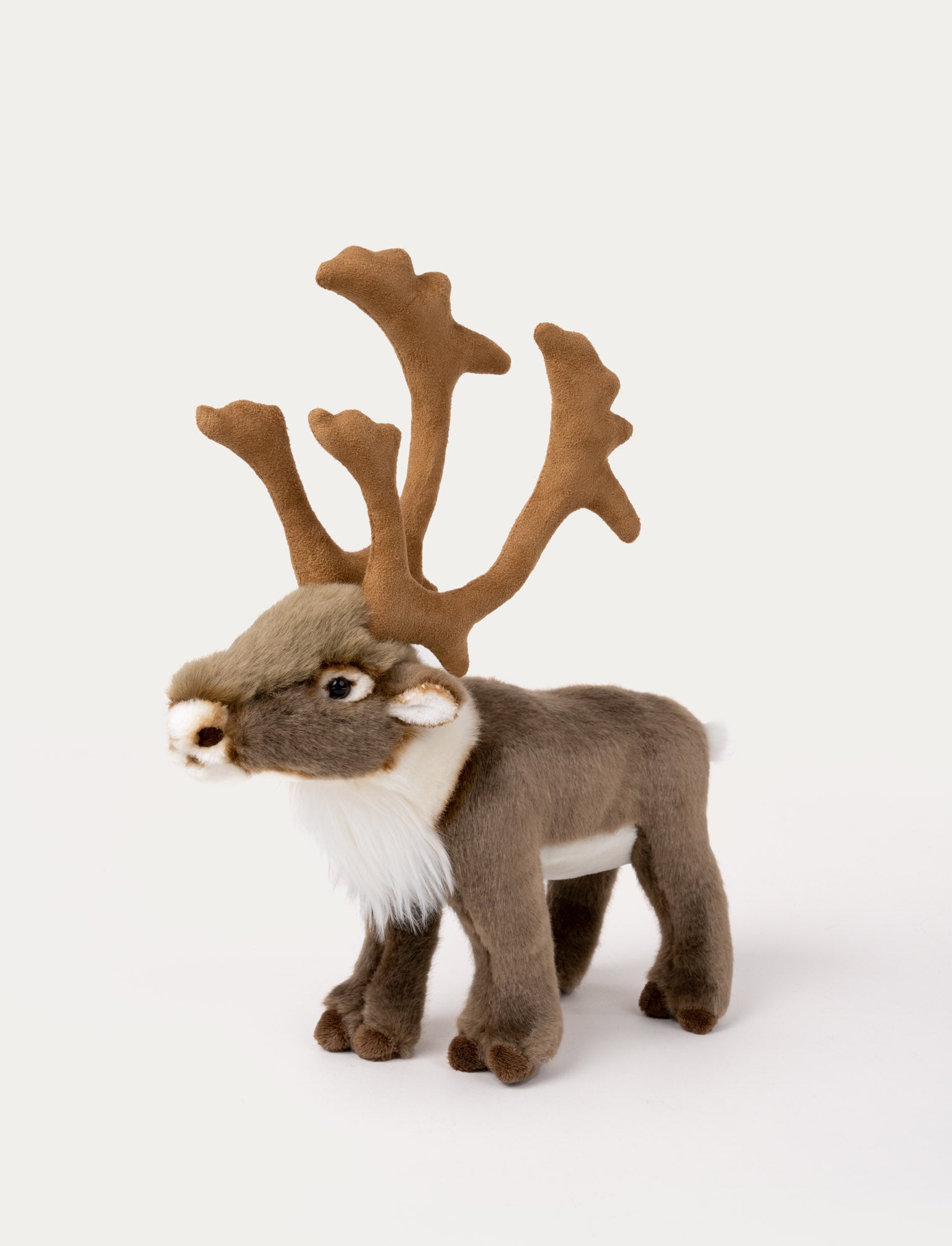  Image of Soft reindeer plush with brown fur, large detailed antlers, a fluffy mane, and shiny black eyes.